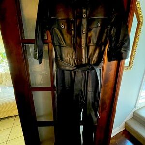 Faux leather jumpsuit with wide legs and pockets!